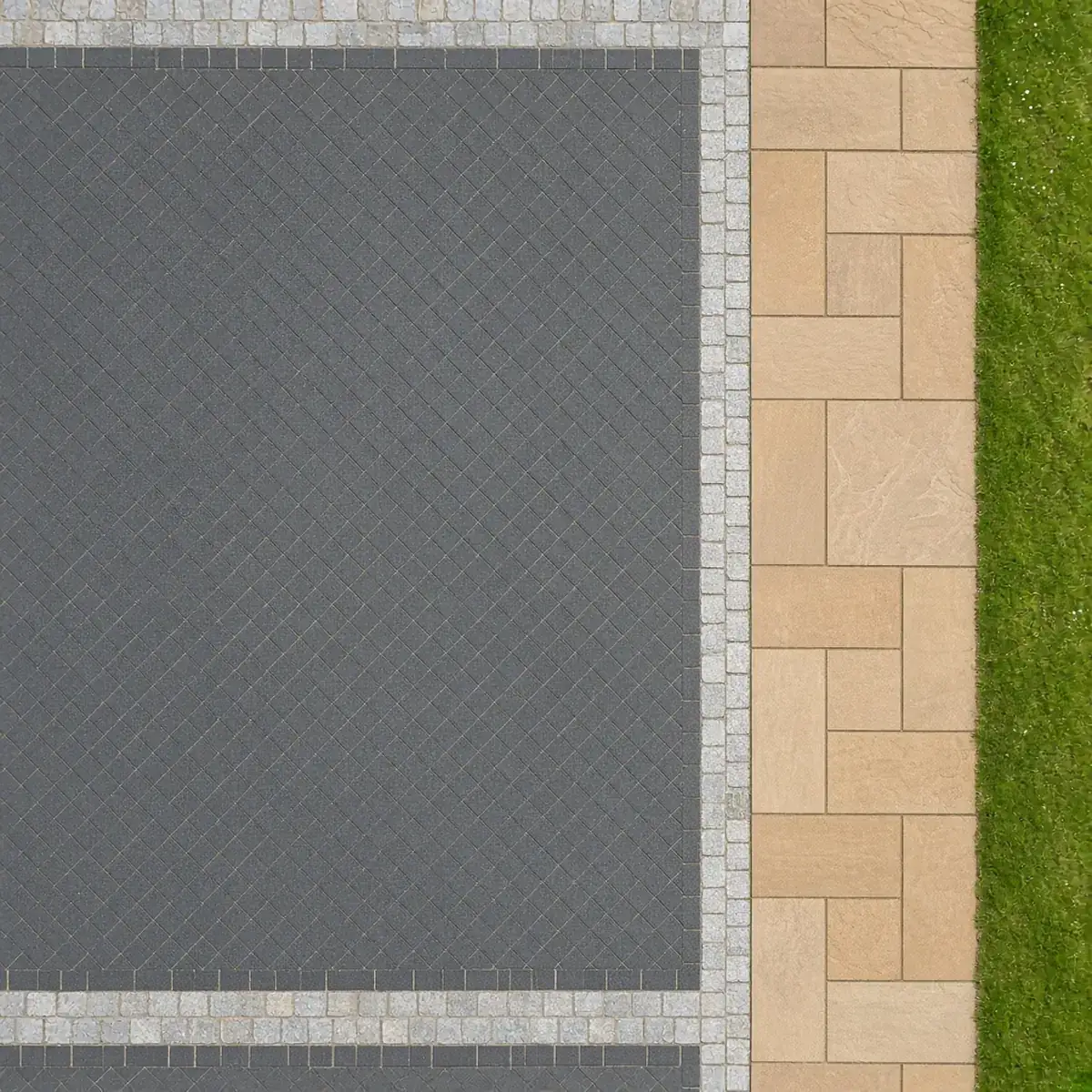 Overhead view of a charcoal block driveway with buff sandstone border and lawn edge